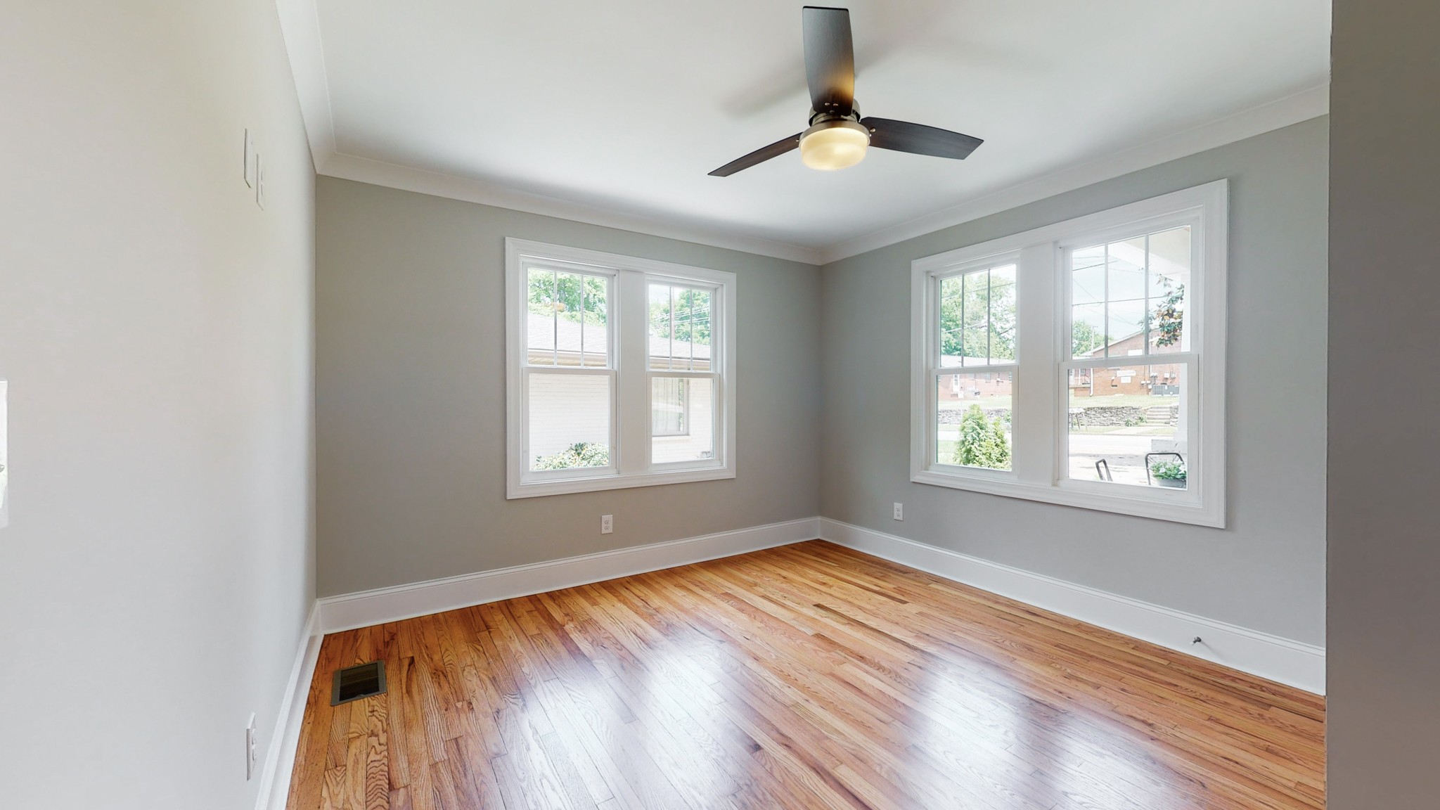4109 Murphy Road Nashville, TN 37209 - Photo 20 of 31 a view of an empty room with wooden floor and a window
