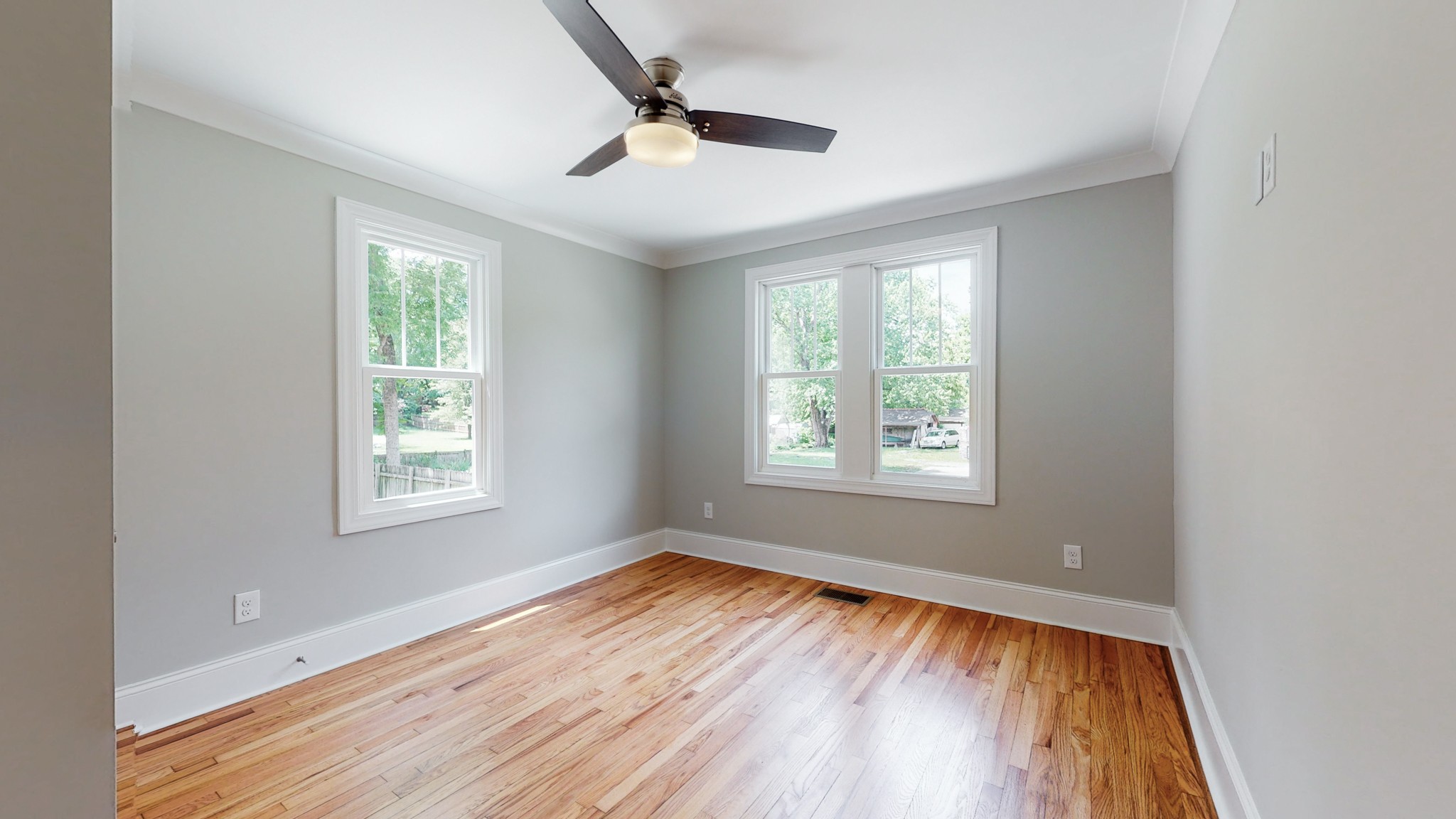 4109 Murphy Road Nashville, TN 37209 - Photo 21 of 31 a view of an empty room with wooden floor and a window