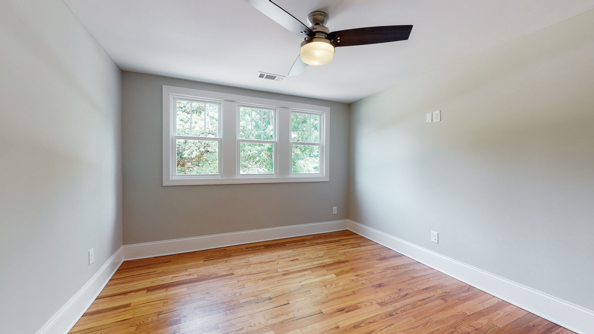 4109 Murphy Road Nashville, TN 37209 - Photo 23 of 31 wooden floor in an empty room with a window