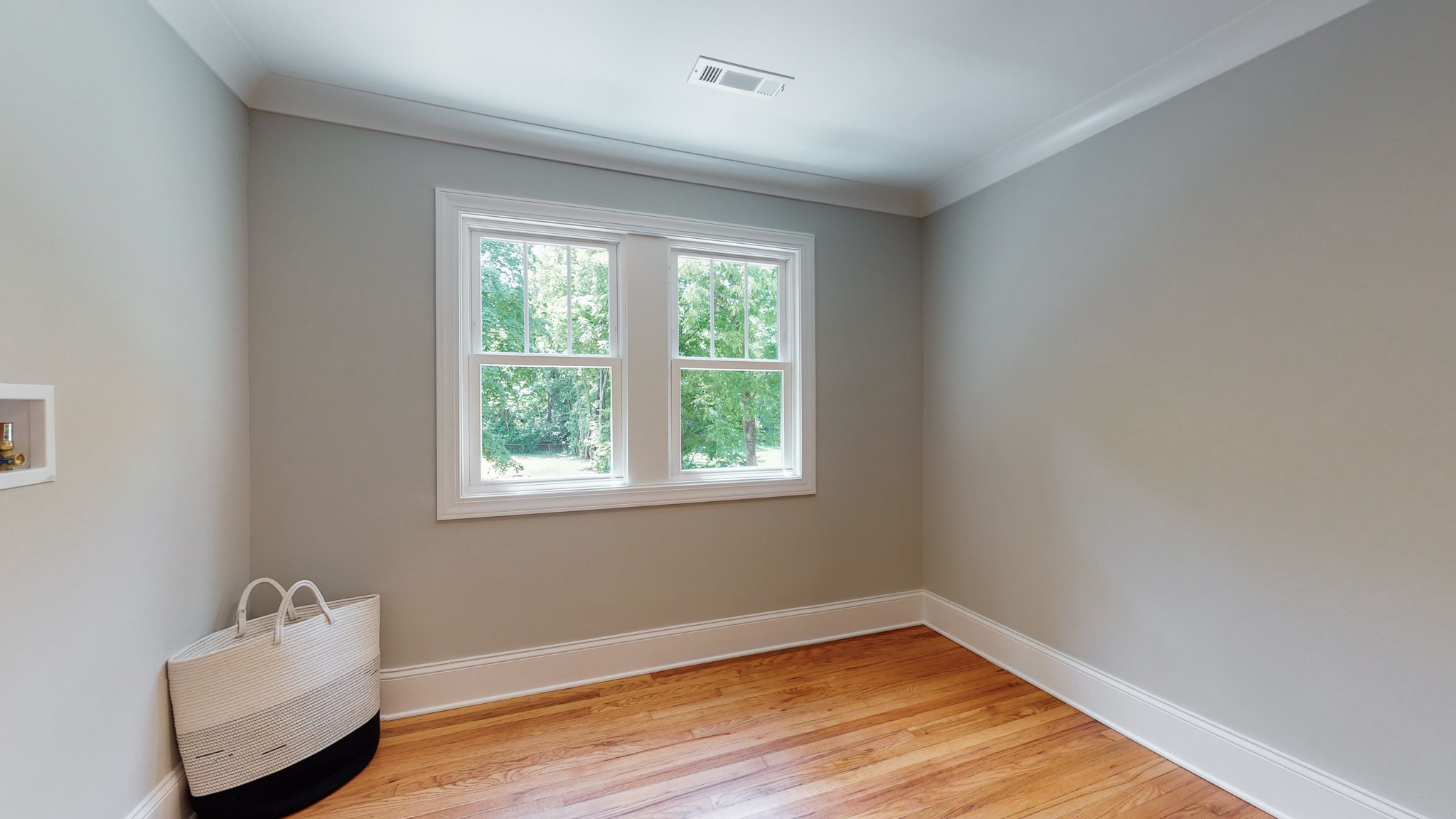 4109 Murphy Road Nashville, TN 37209 - Photo 26 of 31 a view of an empty room with wooden floor and a window