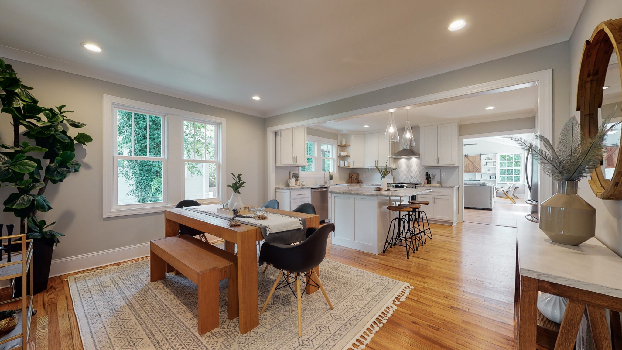 4109 Murphy Road Nashville, TN 37209 - Photo 8 of 31 a living room with furniture a wooden floor and a large window