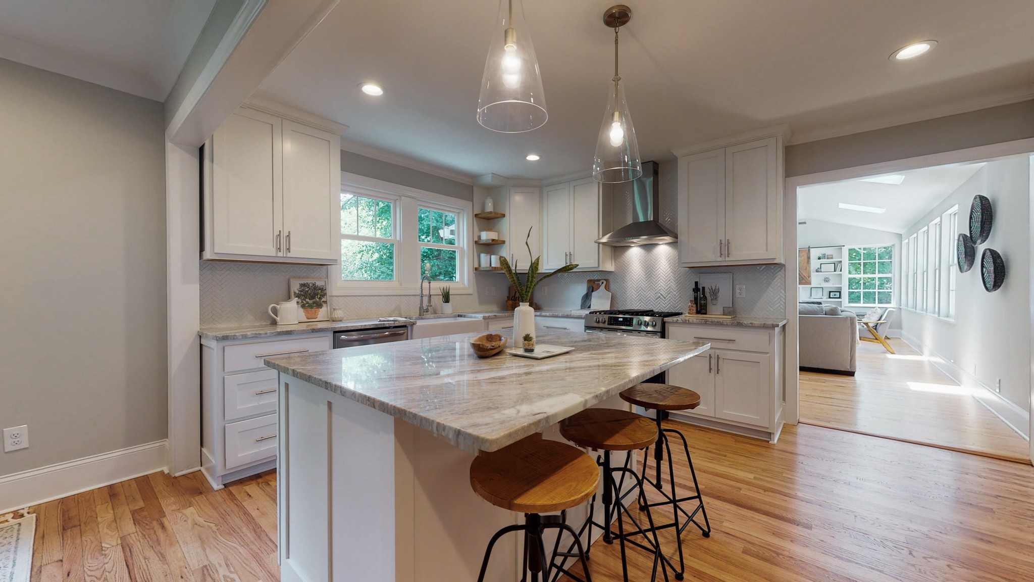 4109 Murphy Road Nashville, TN 37209 - Photo 9 of 31 a kitchen with a dining table cabinets and wooden floor