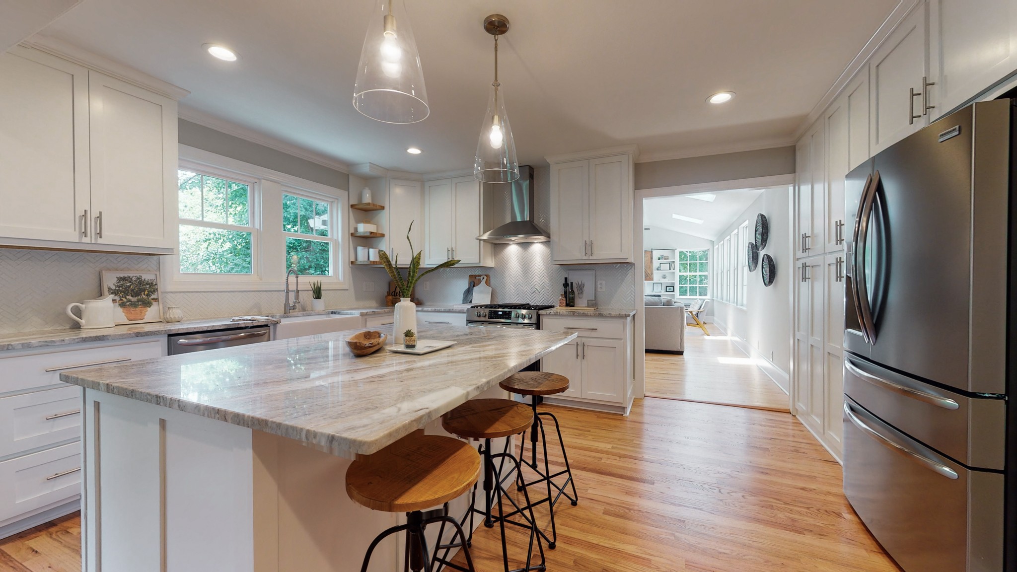4109 Murphy Road Nashville, TN 37209 - Photo 10 of 31 a kitchen with stainless steel appliances granite countertop a refrigerator a sink dishwasher a stove and a refrigerator with wooden floor