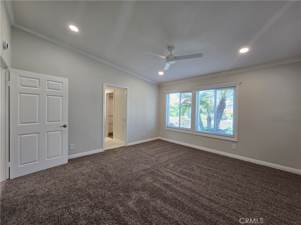 6846 Barkwood Road Riverside, CA 92506 - Photo 9 of 27 an empty room with windows and closet