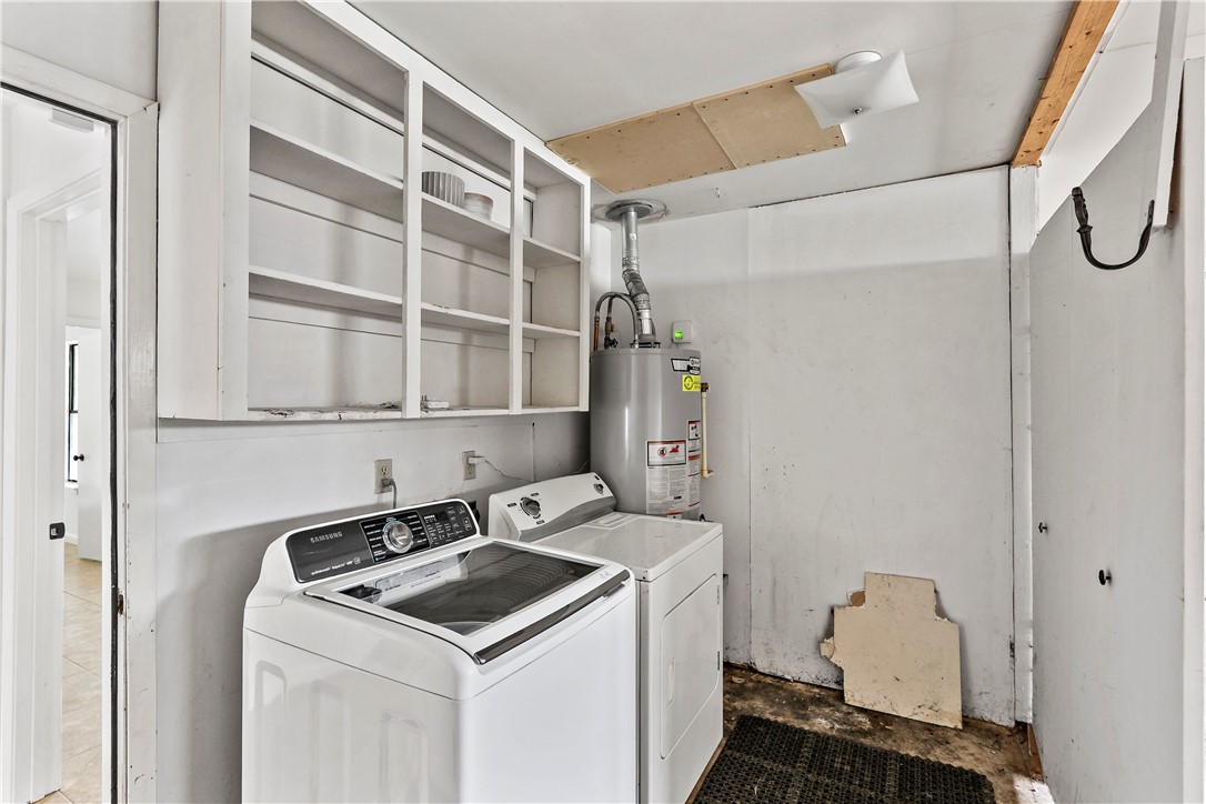 2208 Lobo Drive Bryan, TX 77807 - Photo 21 of 23 a utility room with dryer and washer