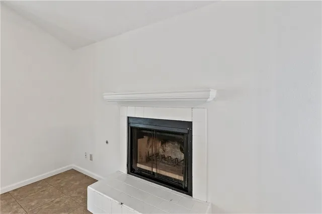 a living room with a fireplace