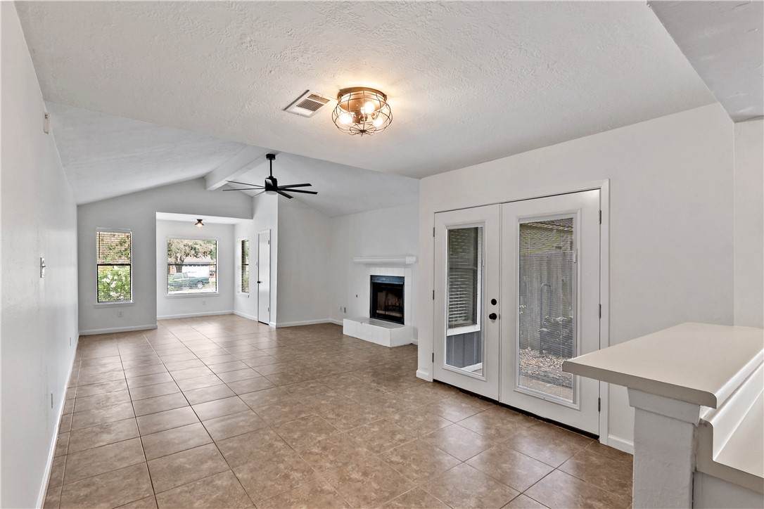 2208 Lobo Drive Bryan, TX 77807 - Photo 10 of 23 wooden floor in an empty room with a window