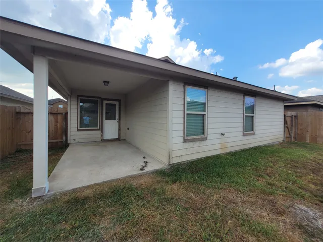 a view of backyard of house