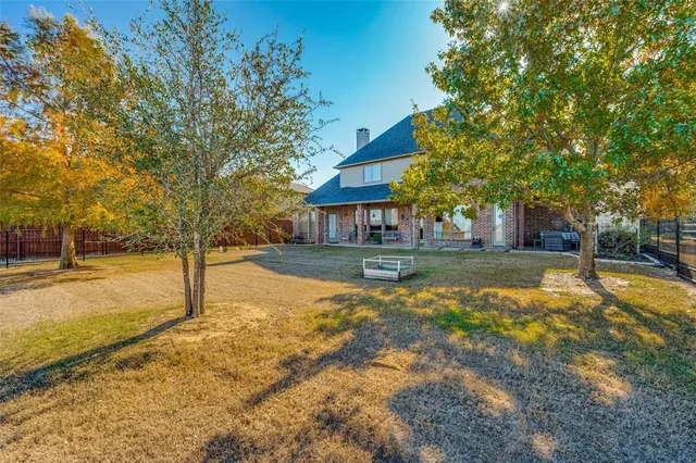 a view of a house with swimming pool