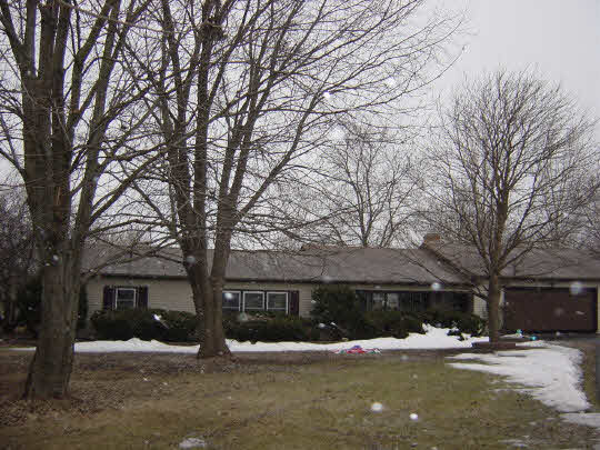 2886 Poole Road Belvidere, IL 61008 - Photo 1 of 1 a front view of a house with a yard