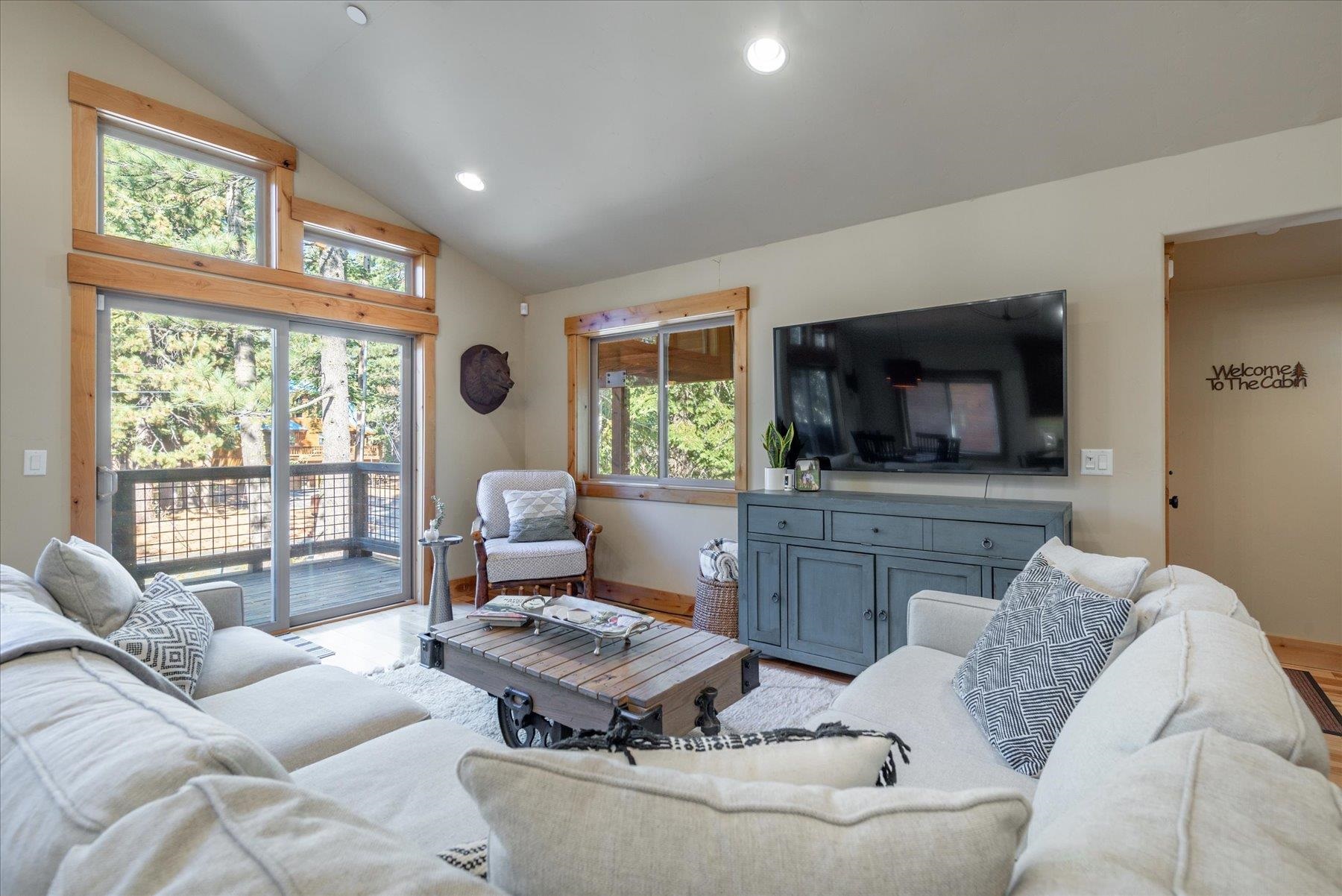 14791 Tyrol Road Truckee, CA 96161 - Photo 5 of 24 a living room with furniture and a flat screen tv