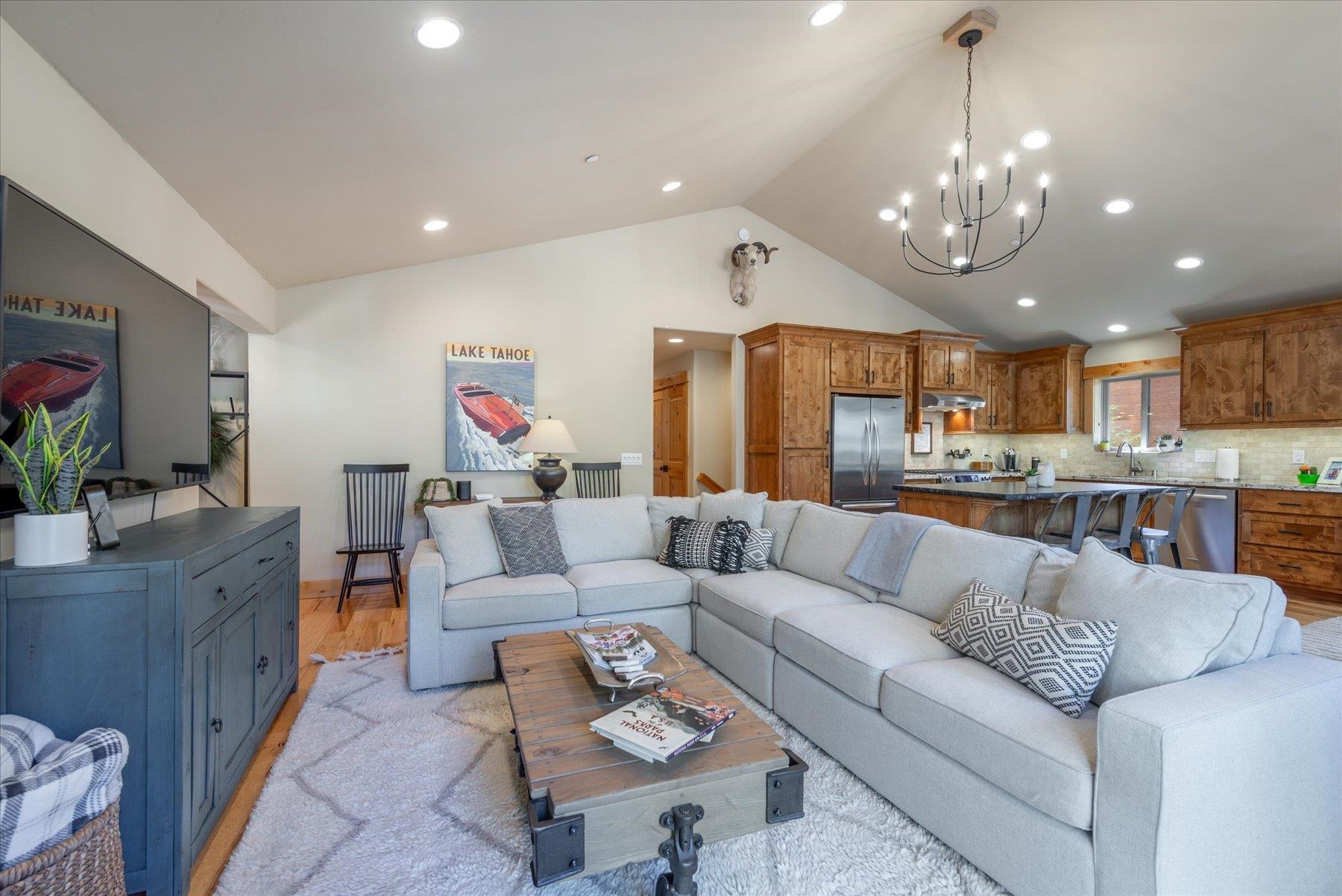 14791 Tyrol Road Truckee, CA 96161 - Photo 6 of 24 a living room with furniture kitchen and a chandelier