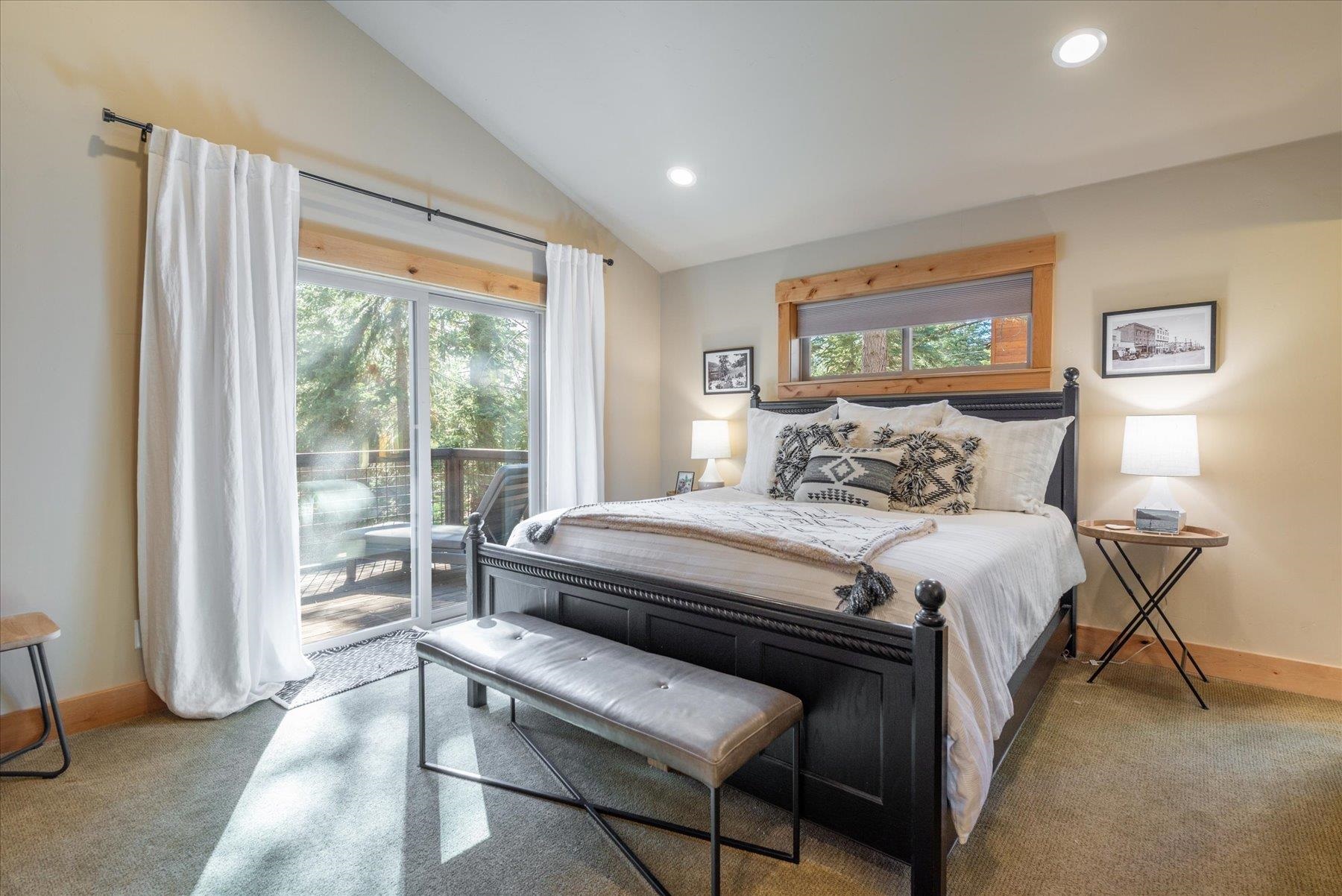 14791 Tyrol Road Truckee, CA 96161 - Photo 10 of 24 a bedroom with a bed and a large window