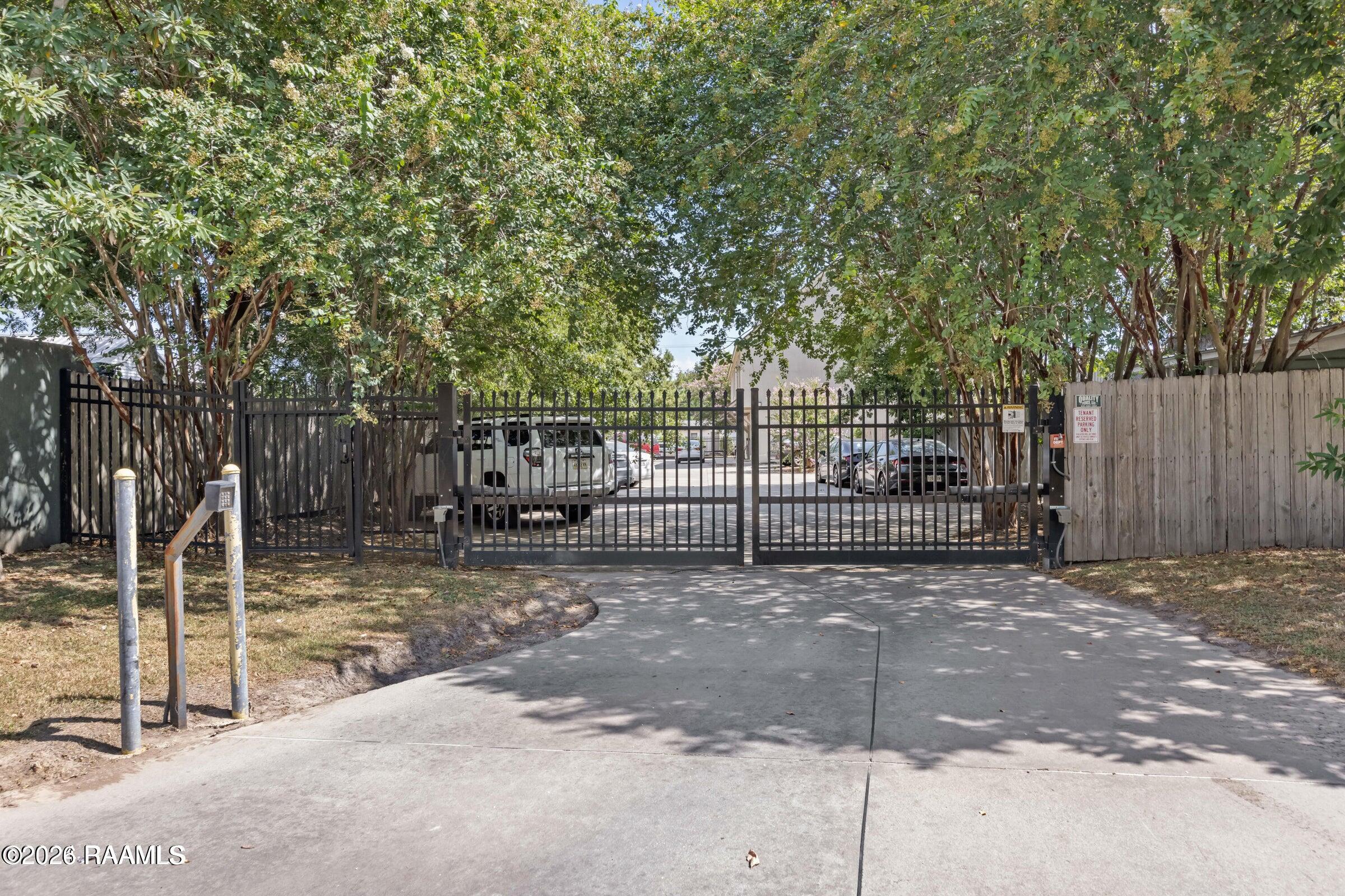 1402 Jefferson Street, Unit 201 Lafayette, LA 70501 - Photo 6 of 34 gate closed