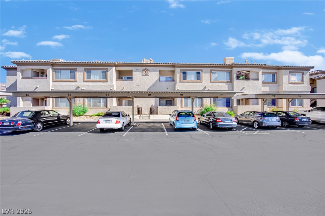8725 West Flamingo Road, Unit 110 Las Vegas, NV 89147 - Photo 26 of 30 Secure covered parking awaits in this modern apartment complex, ensuring convenience and protection for residents.