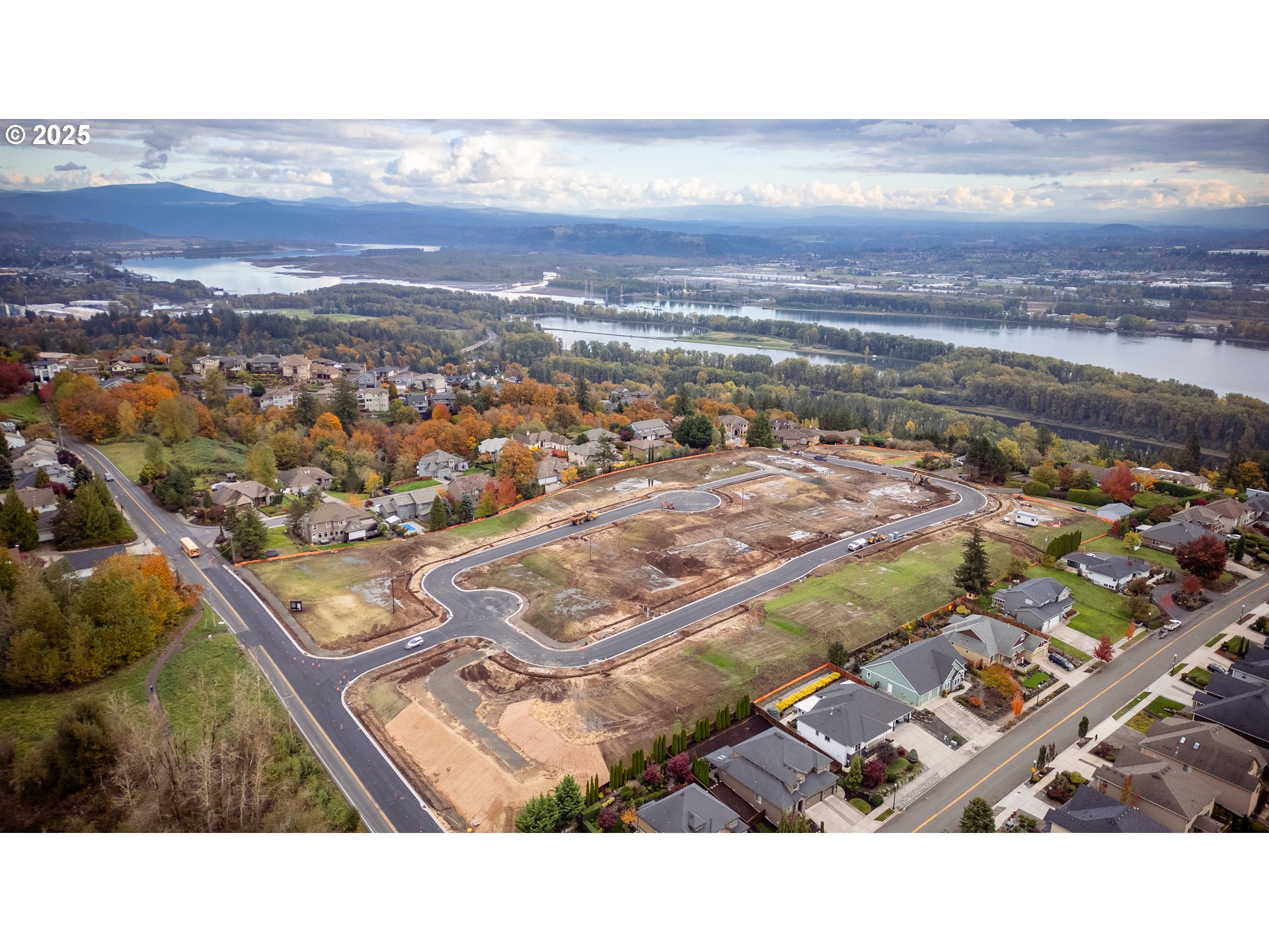 667 Northwest Halifax Street, Unit LOT 8 Camas, WA 98607 - Photo 7 of 9 a view of a city with an ocean