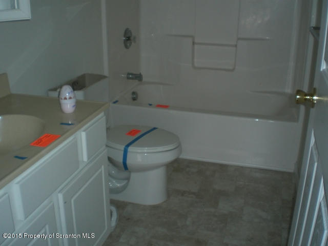 1002 Laurel Road Pocono Summit, PA 18346 - Photo 11 of 13 a bathroom with a toilet and a shower