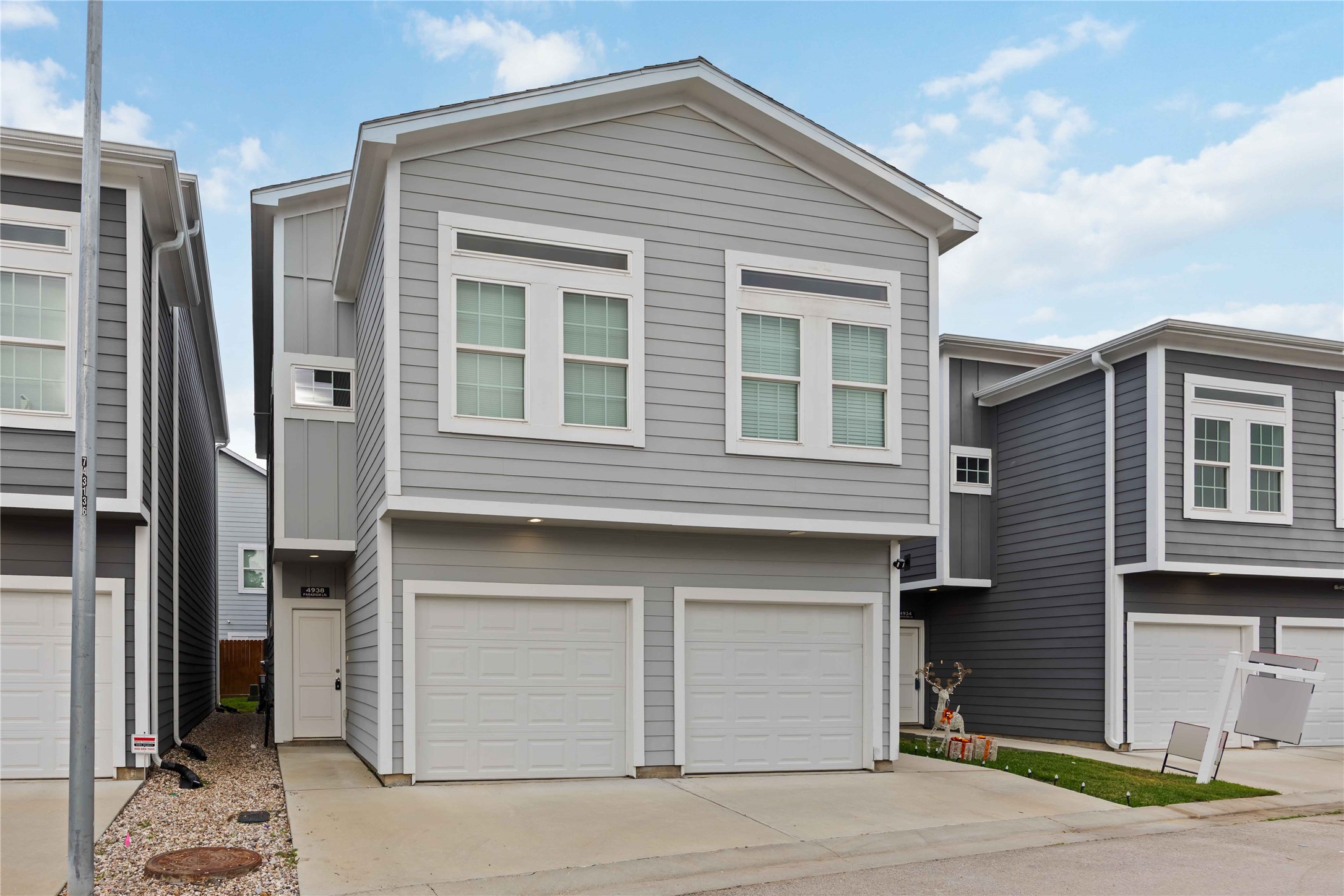 a front view of a house with a garage