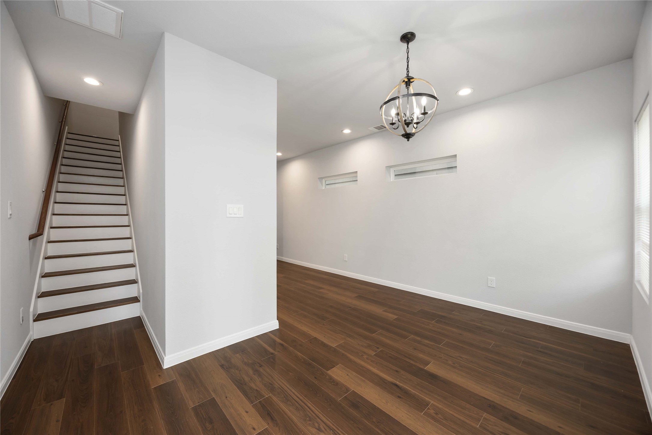 4938 Paradigm Ln Spring Spring, TX 77379 - Photo 12 of 26 a view of a room with wooden floor fan and window
