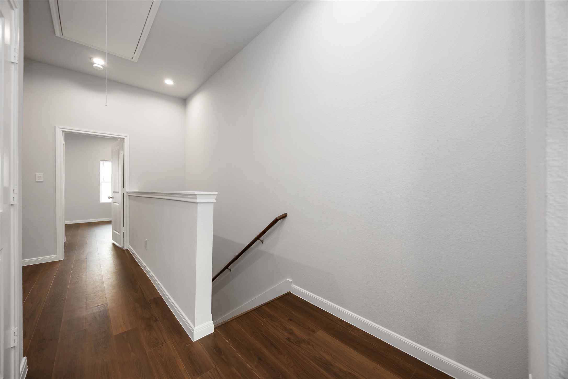 4938 Paradigm Ln Spring Spring, TX 77379 - Photo 13 of 26 a view of a hallway with wooden floor