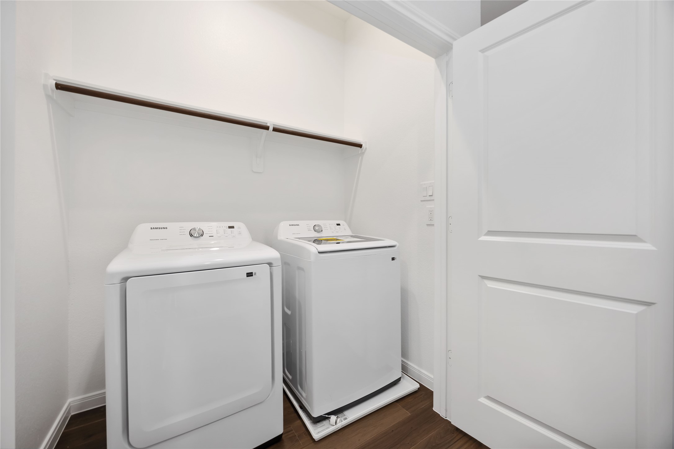 4938 Paradigm Ln Spring Spring, TX 77379 - Photo 20 of 26 a utility room with dryer and washer