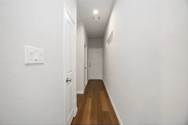 a kitchen with stainless steel appliances a microwave a stove a refrigerator sink and microwave