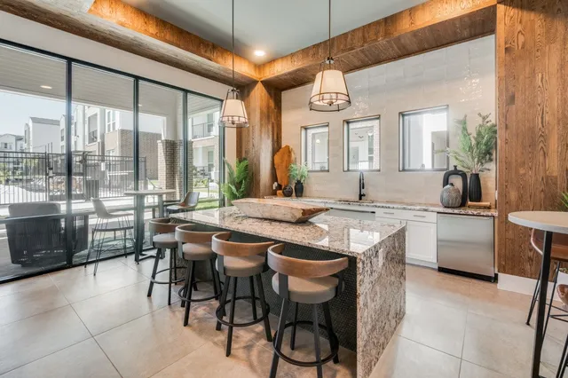 a bathroom with a shower and a sink