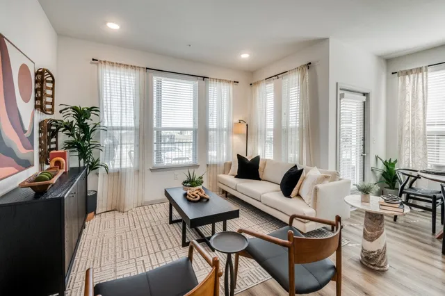 a kitchen with stainless steel appliances granite countertop a sink and cabinets