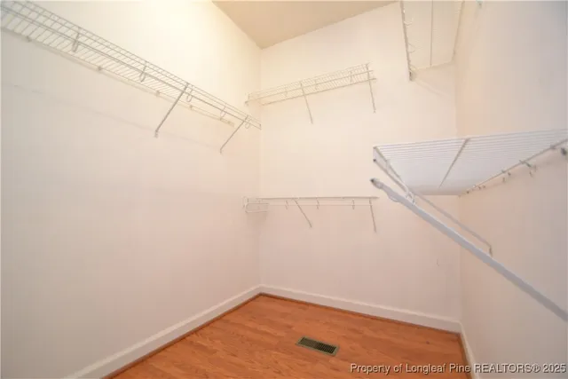 a view of a room with racks on the wall