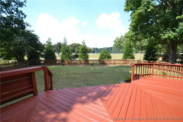 a view of swimming pool with chairs
