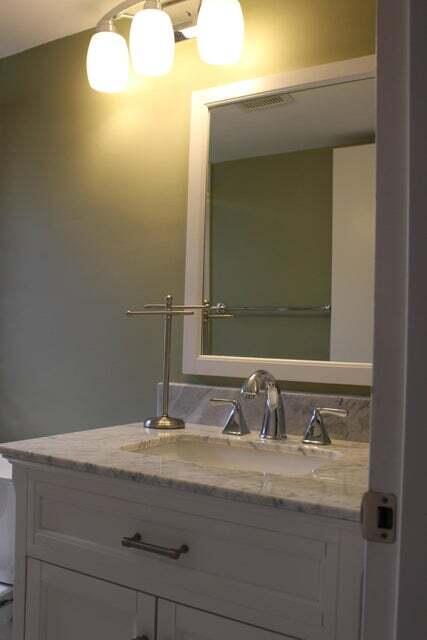 46 Mansfield B Boca Raton, FL 33434 - Photo 13 of 70 a bathroom with a sink and a mirror