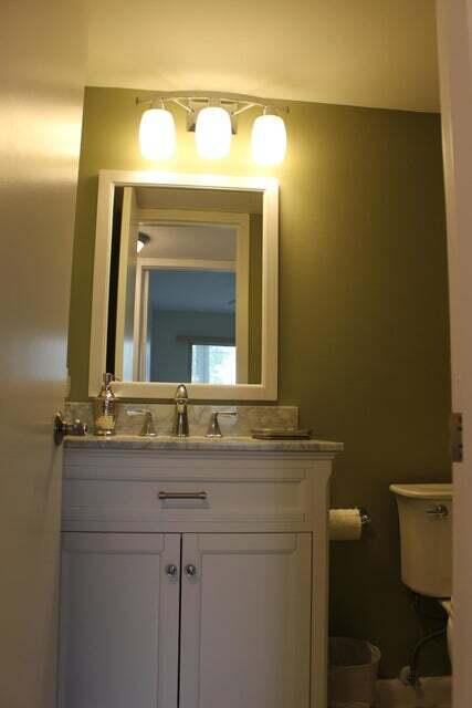 46 Mansfield B Boca Raton, FL 33434 - Photo 21 of 70 a bathroom with a toilet sink and mirror