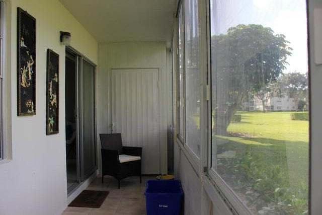 46 Mansfield B Boca Raton, FL 33434 - Photo 24 of 70 a bathroom with a tub and shower view