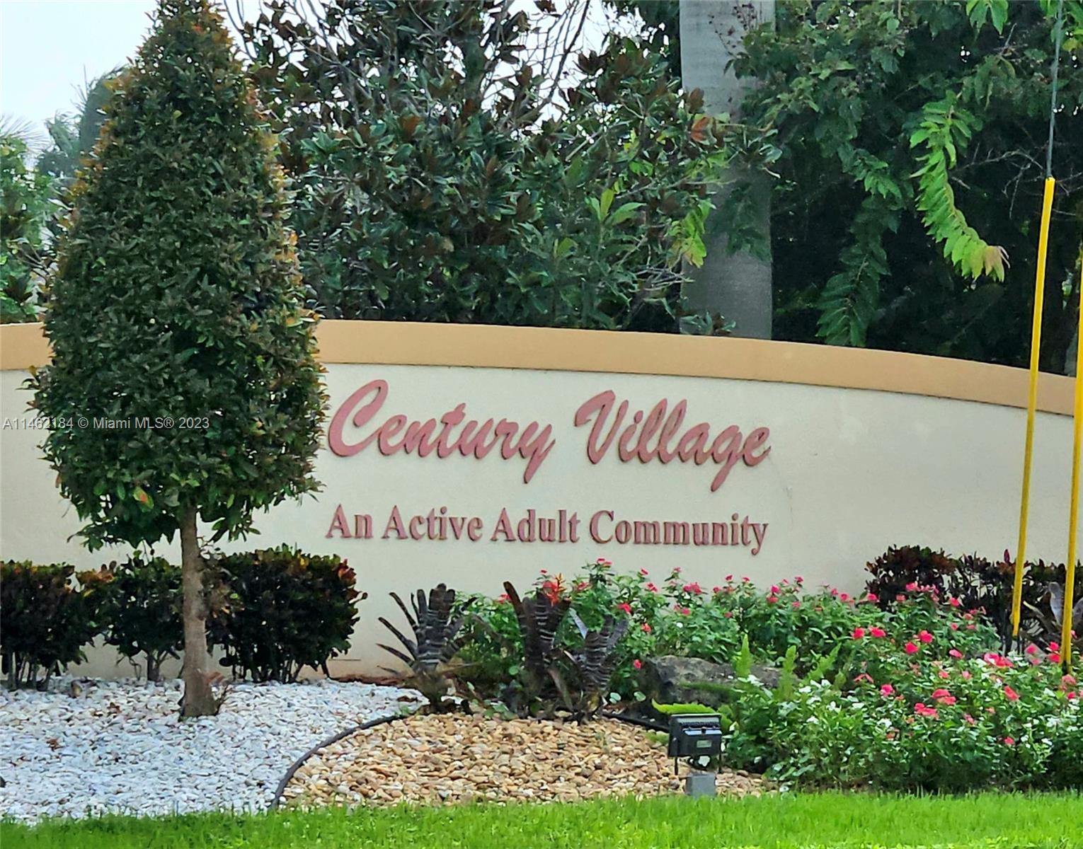 46 Mansfield B Boca Raton, FL 33434 - Photo 61 of 70 a sign on the side of the road