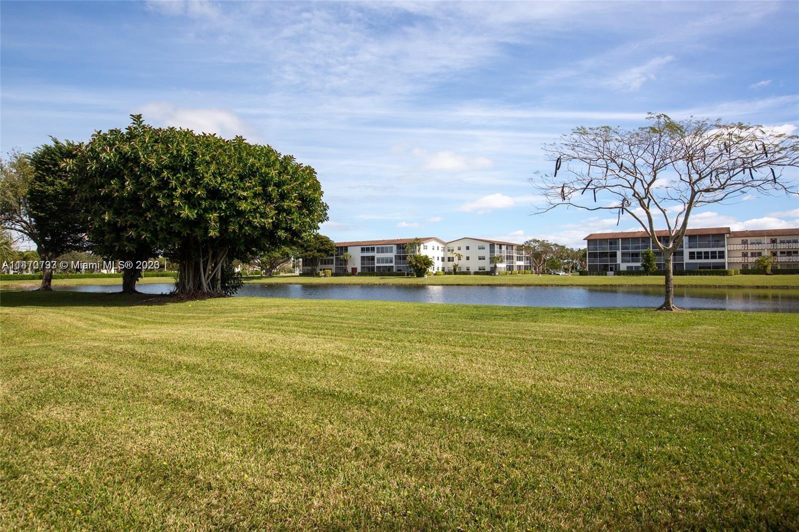 46 Mansfield B Boca Raton, FL 33434 - Photo 64 of 70 a view of swimming pool with outdoor space and seating area
