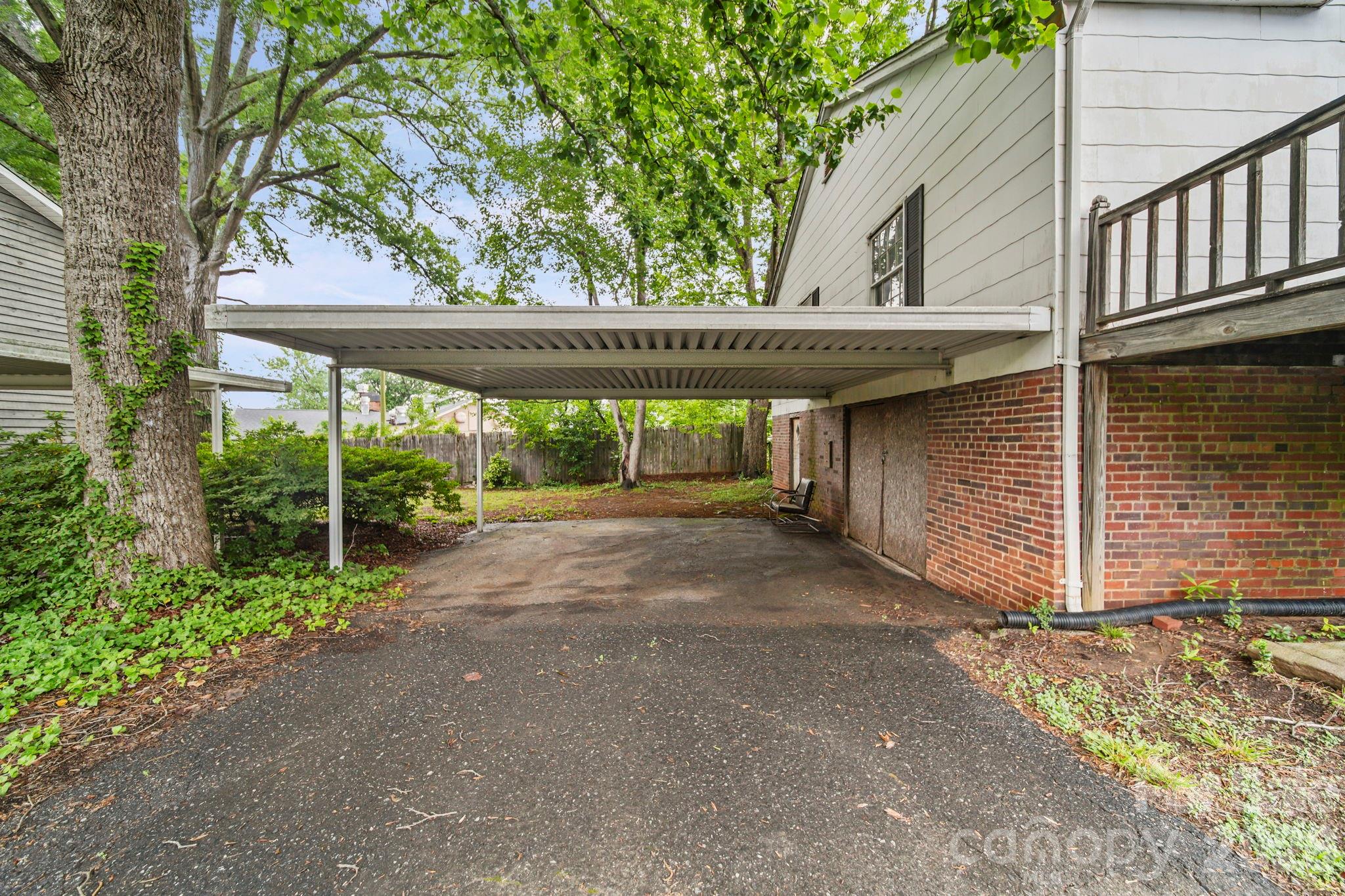 1109 Union Road Gastonia, NC 28054 - Photo 21 of 44 a view of a house with a yard and tree s