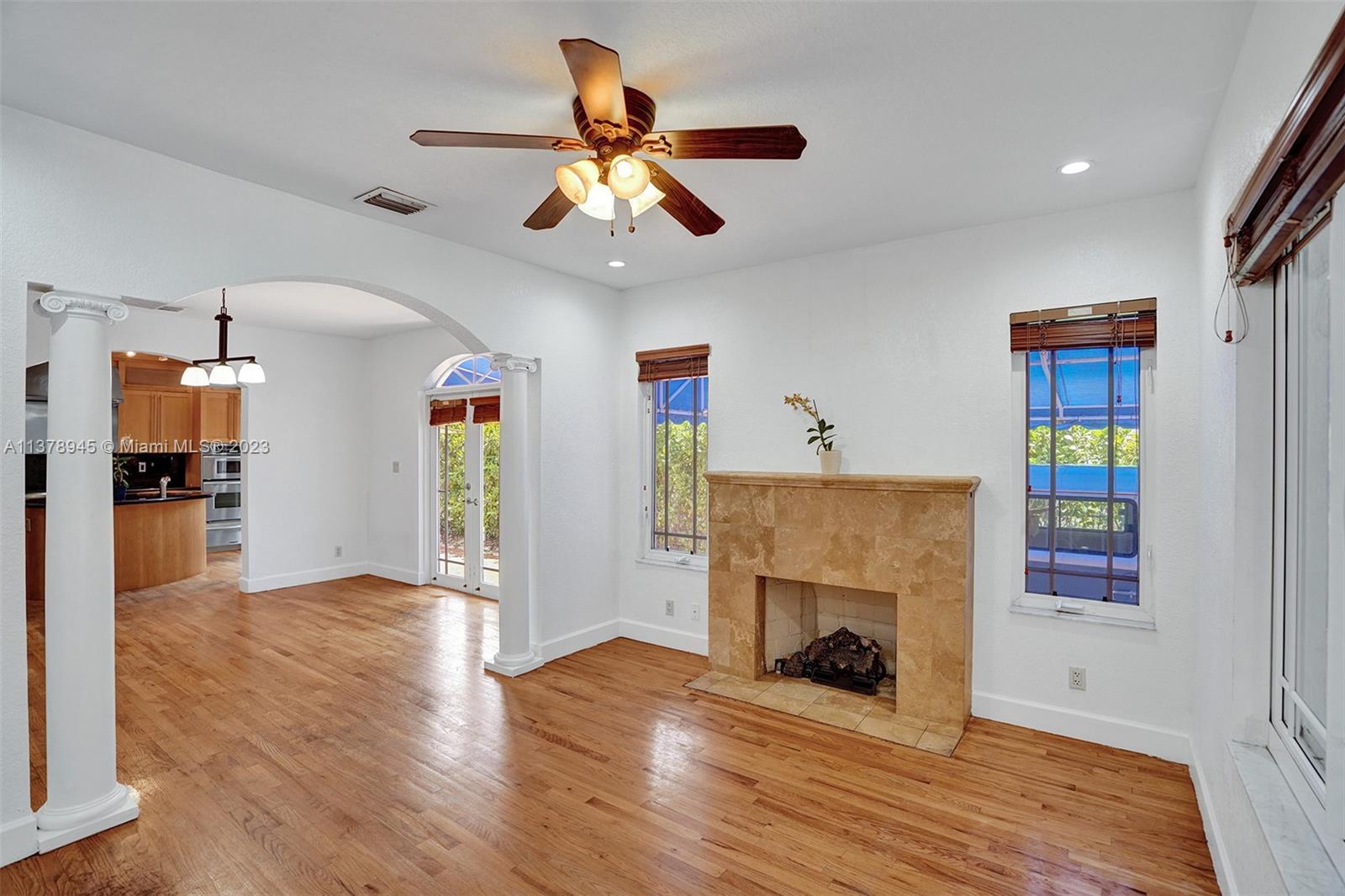 2231 Southwest 17th Street Miami, FL 33145 - Photo 20 of 69 a living room with furniture and a fireplace