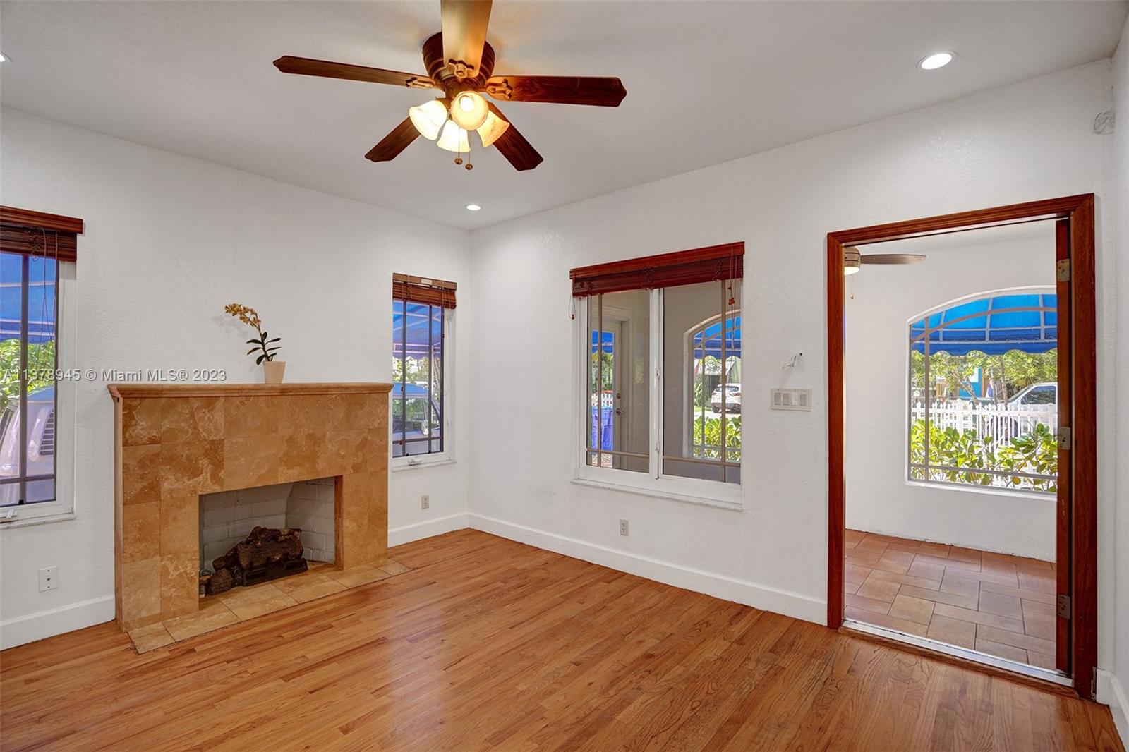 2231 Southwest 17th Street Miami, FL 33145 - Photo 22 of 69 a view of an empty room with window and wooden floor