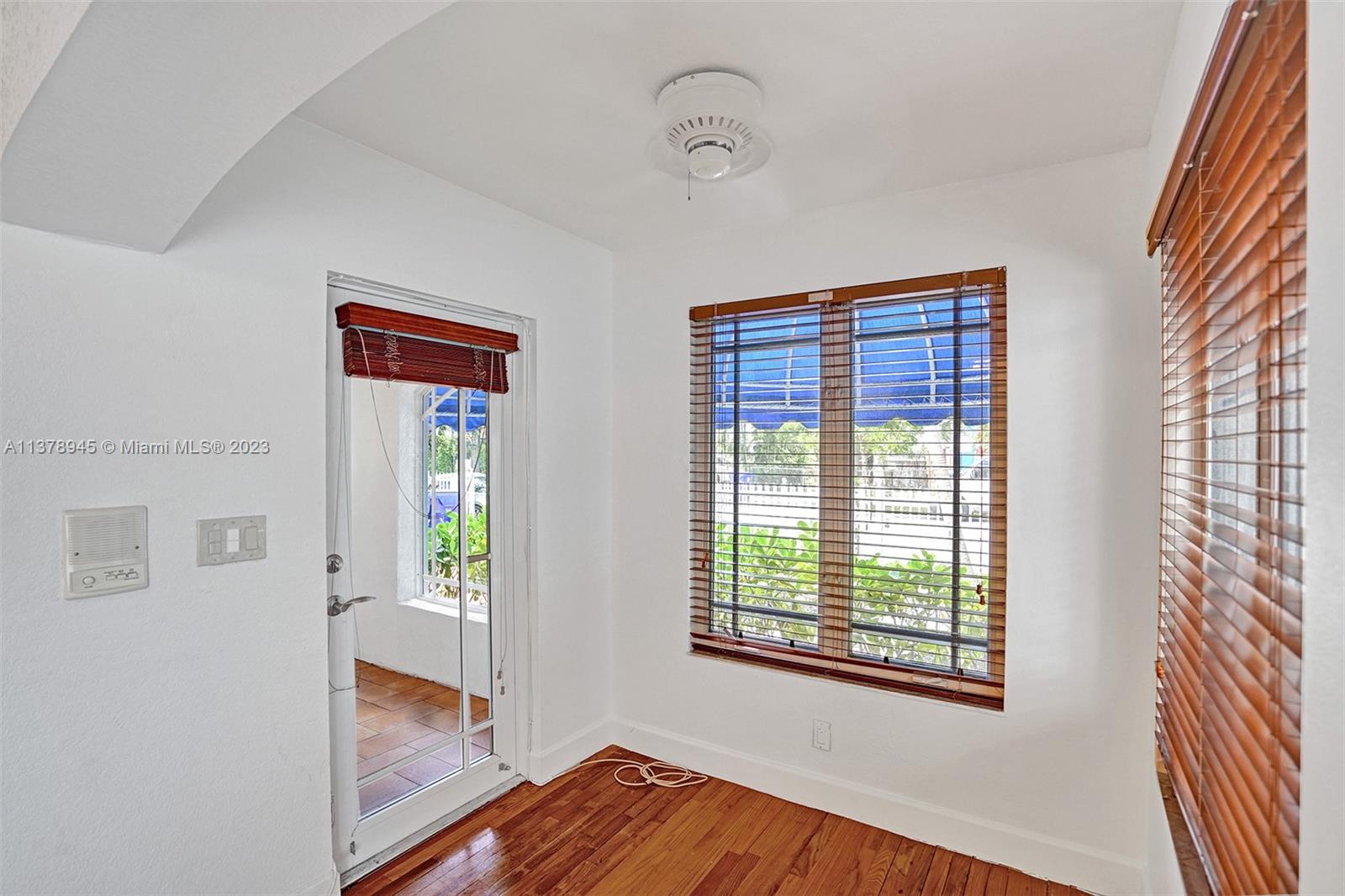 2231 Southwest 17th Street Miami, FL 33145 - Photo 37 of 69 a view of hallway with wooden floor and fan