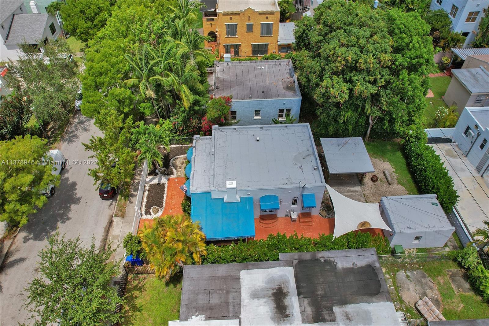 2231 Southwest 17th Street Miami, FL 33145 - Photo 4 of 69 an aerial view of multiple houses with yard