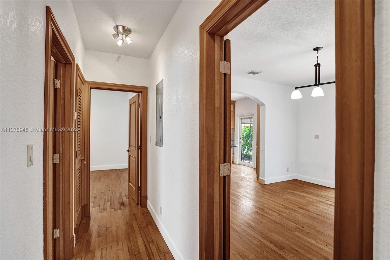 2231 Southwest 17th Street Miami, FL 33145 - Photo 44 of 69 a view of hallway with wooden floor
