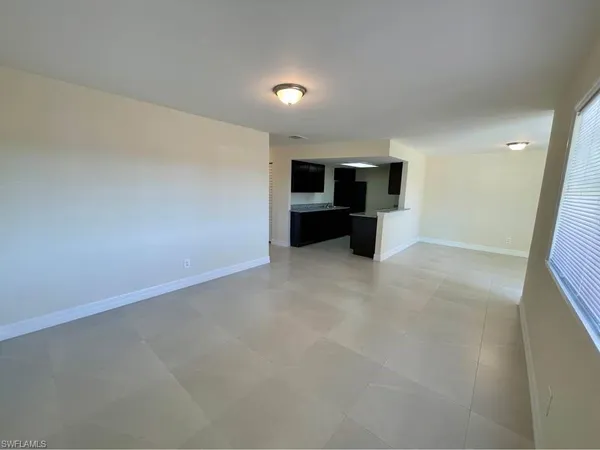 a view of a big room with closet and cabinet