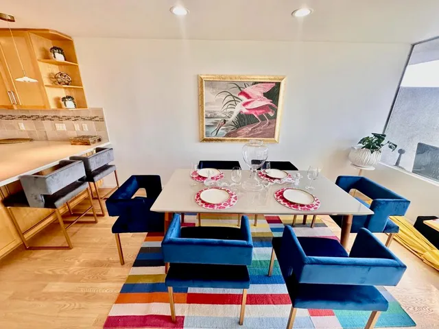a living room with furniture and rug