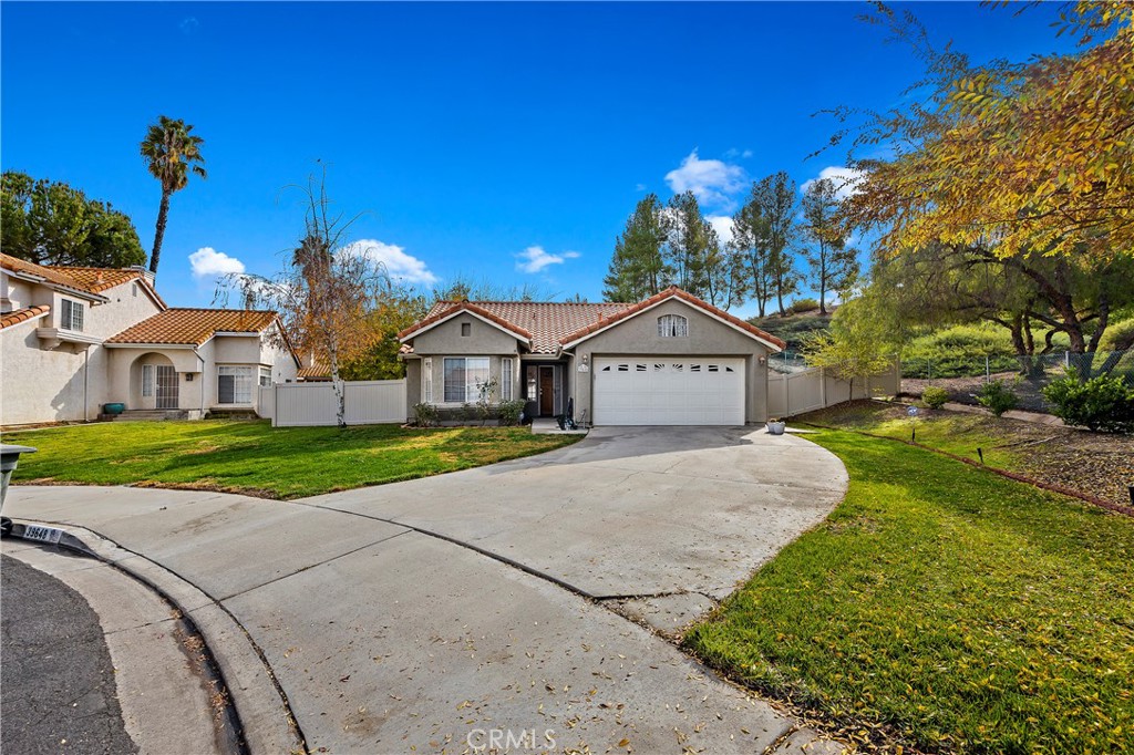 39648 June Court Temecula, CA 92591 - Photo 1 of 1 a front view of a house with garden