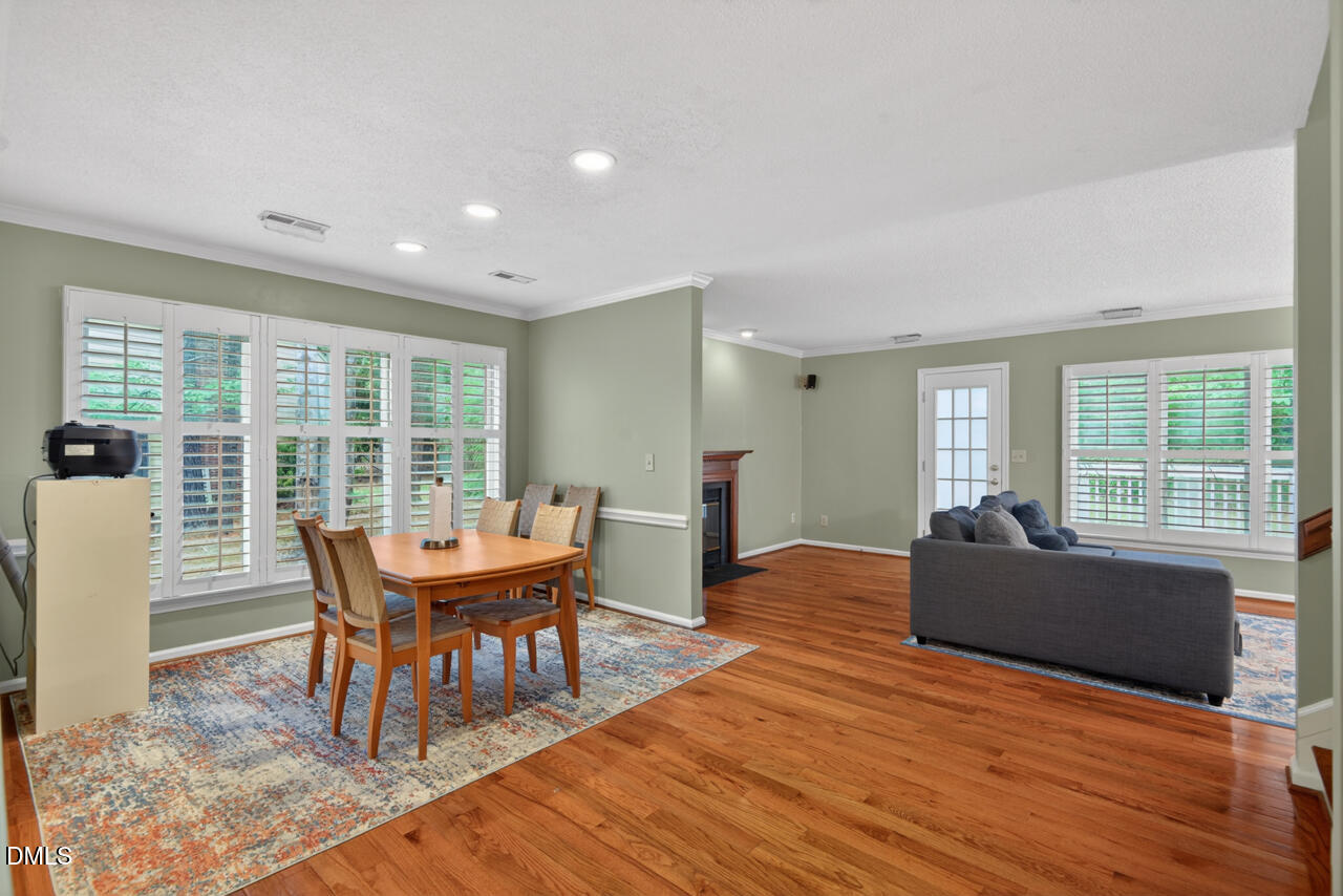 3307 Coachman's Way Durham, NC 27705 - Photo 11 of 50 a dining room with furniture and wooden floor