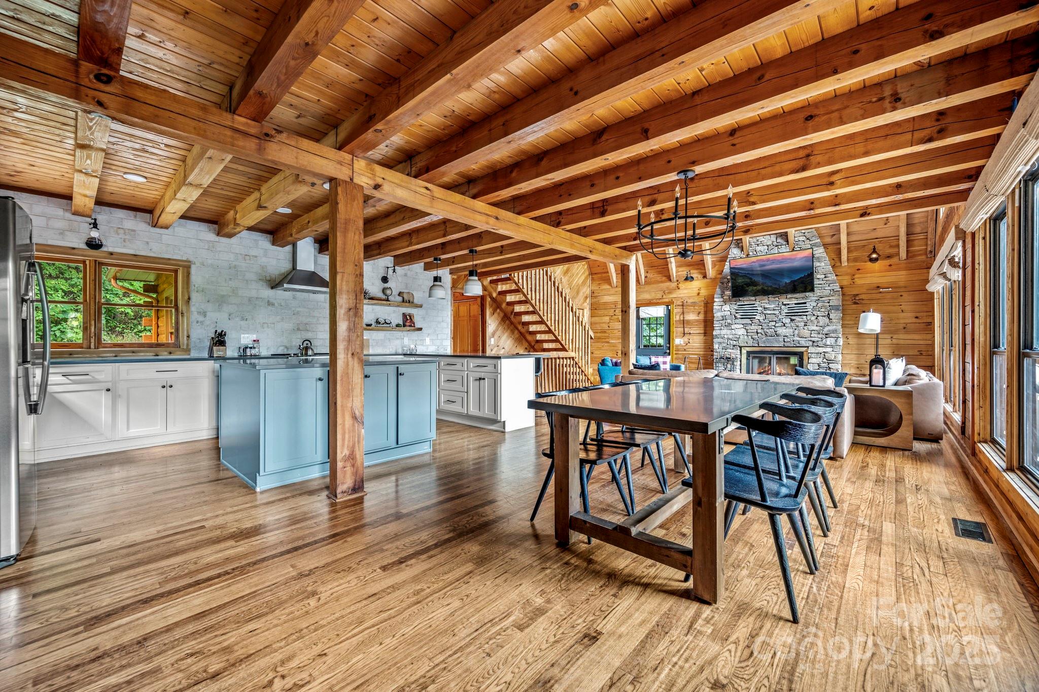 1933 Laurel Ridge North Maggie Valley, NC 28751 - Photo 12 of 45 a view of a dining room with wooden floor