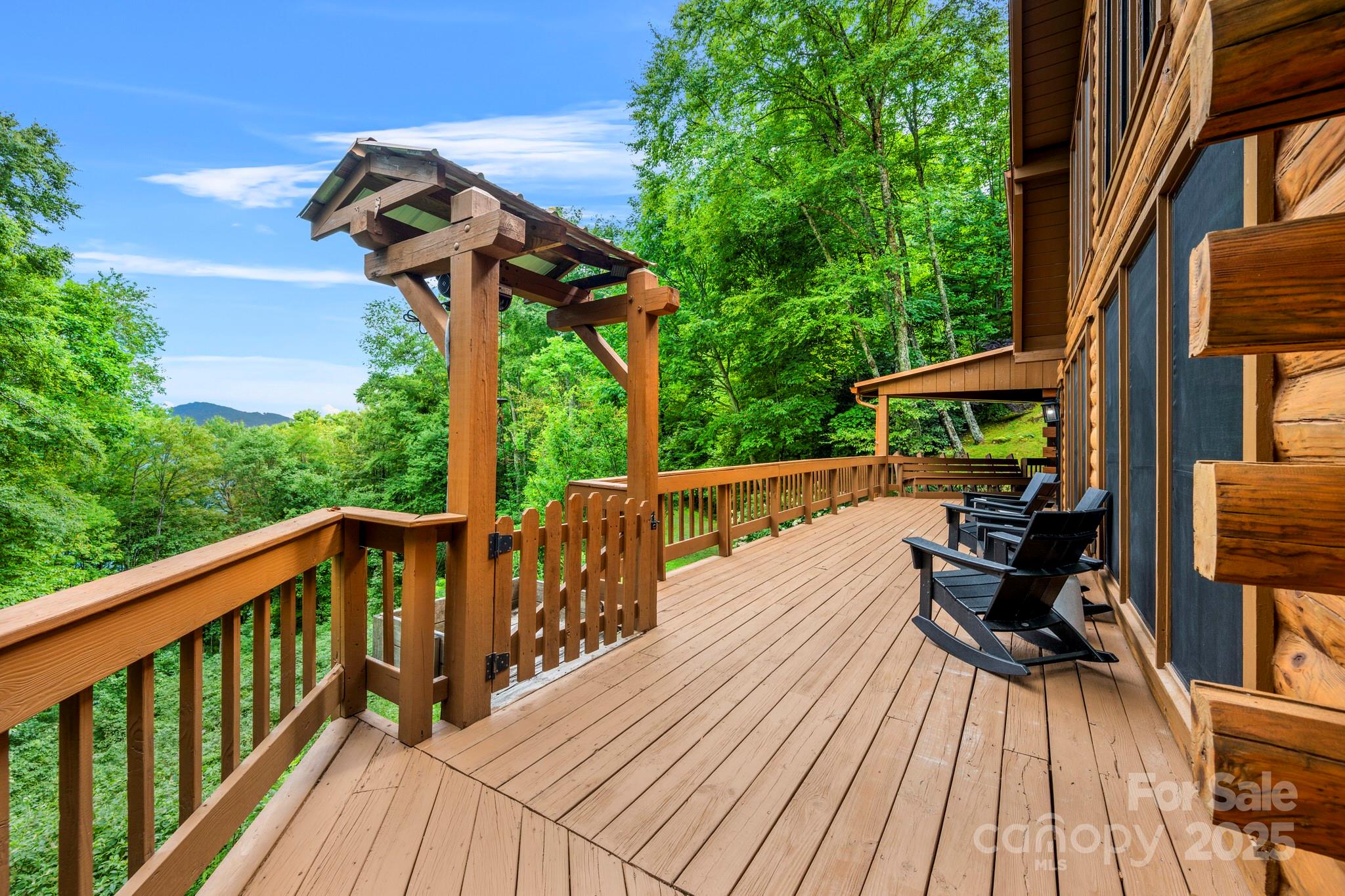 1933 Laurel Ridge North Maggie Valley, NC 28751 - Photo 17 of 45 a view of balcony with furniture and trees
