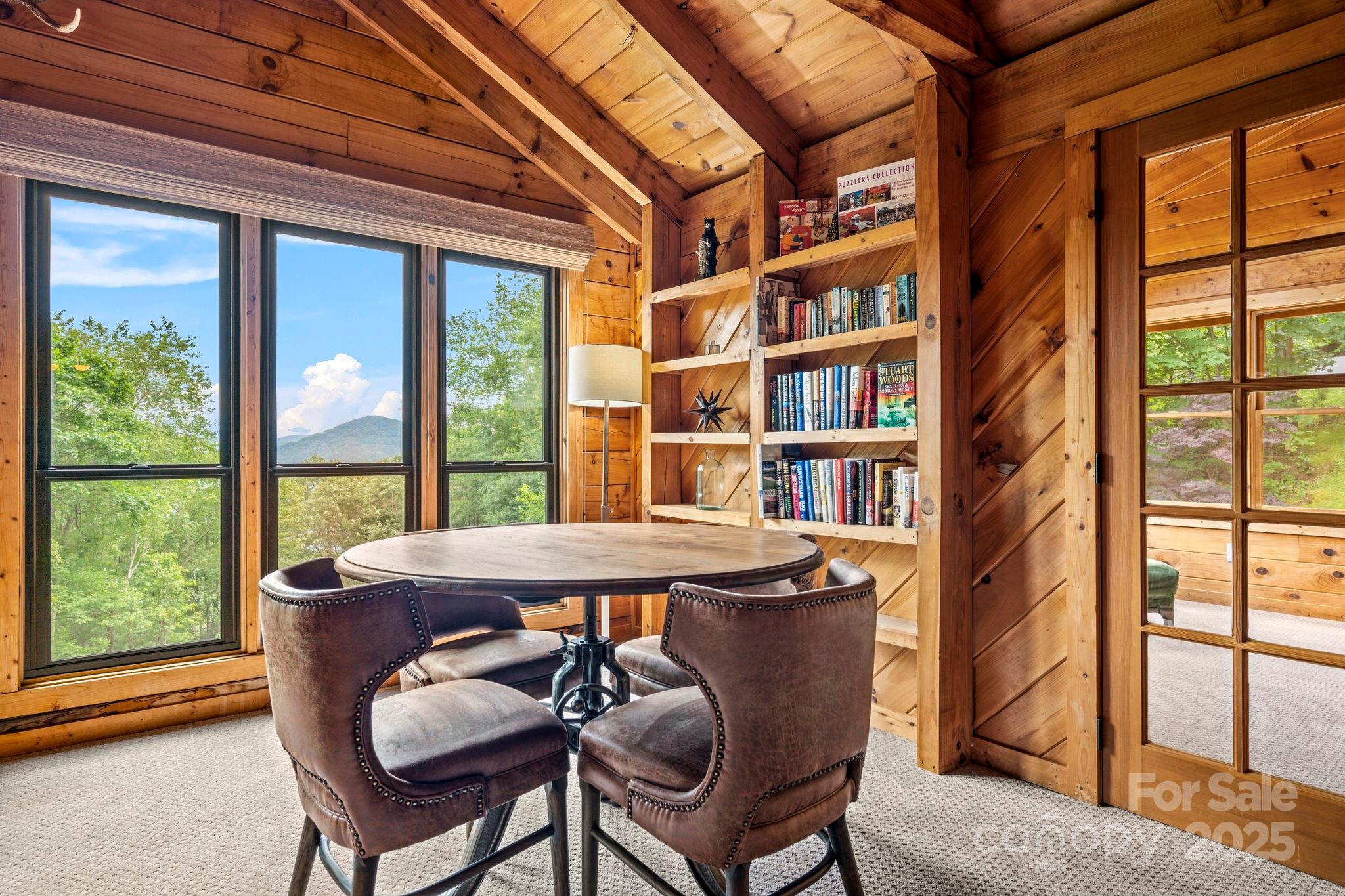 1933 Laurel Ridge North Maggie Valley, NC 28751 - Photo 27 of 45 a view of a dining room with furniture window and outside view