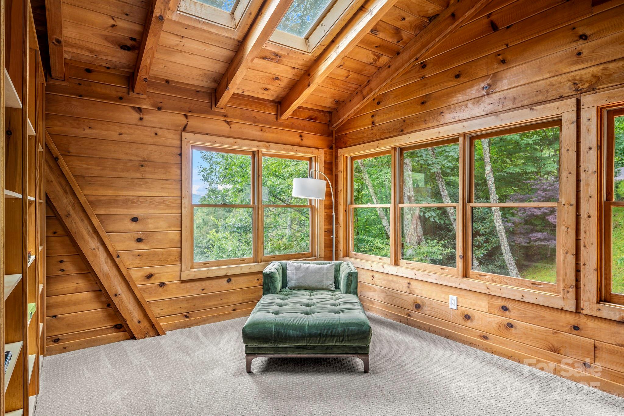 1933 Laurel Ridge North Maggie Valley, NC 28751 - Photo 28 of 45 a living room with furniture and a large window