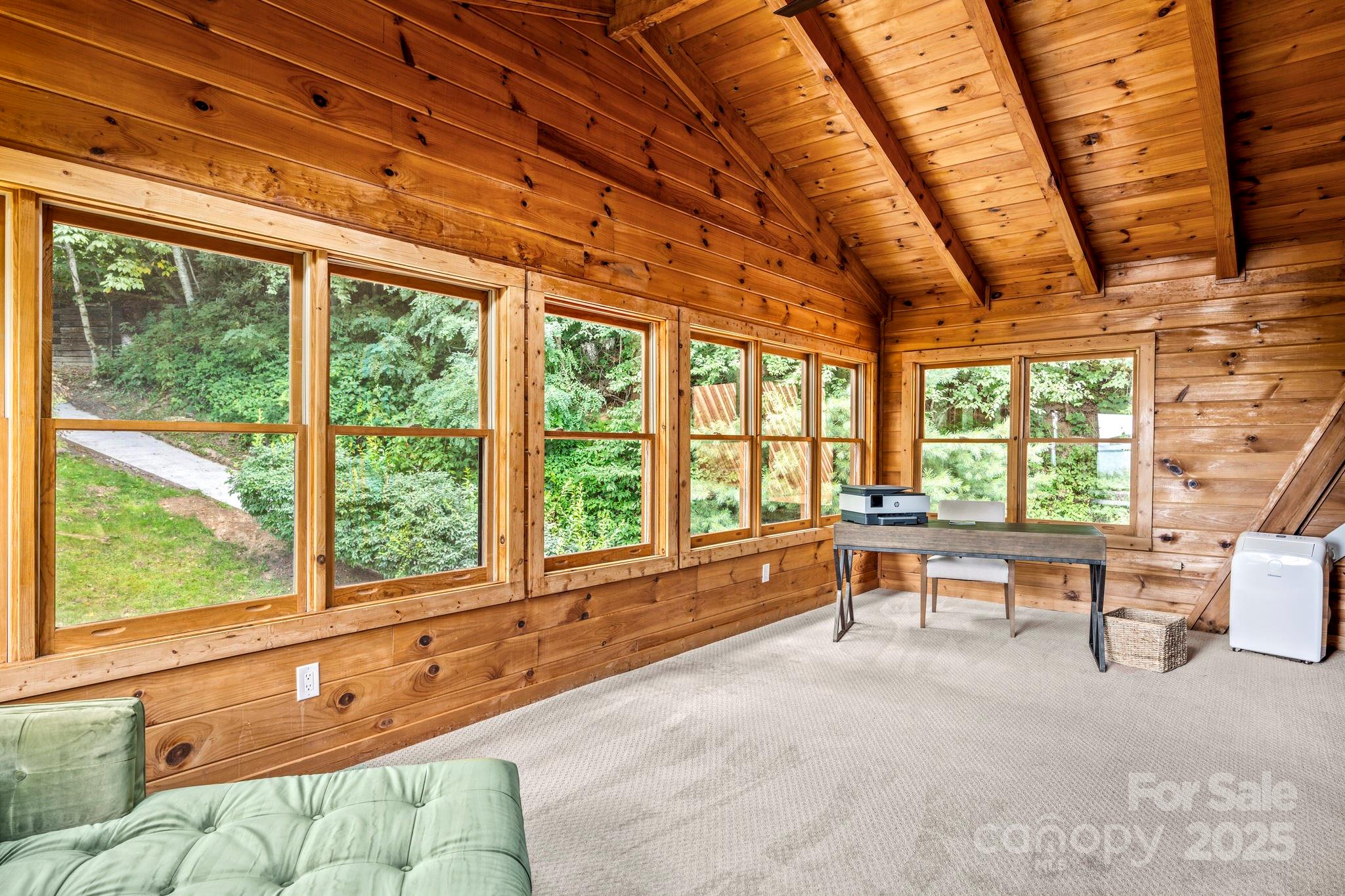 1933 Laurel Ridge North Maggie Valley, NC 28751 - Photo 30 of 45 a living room with furniture and a large window